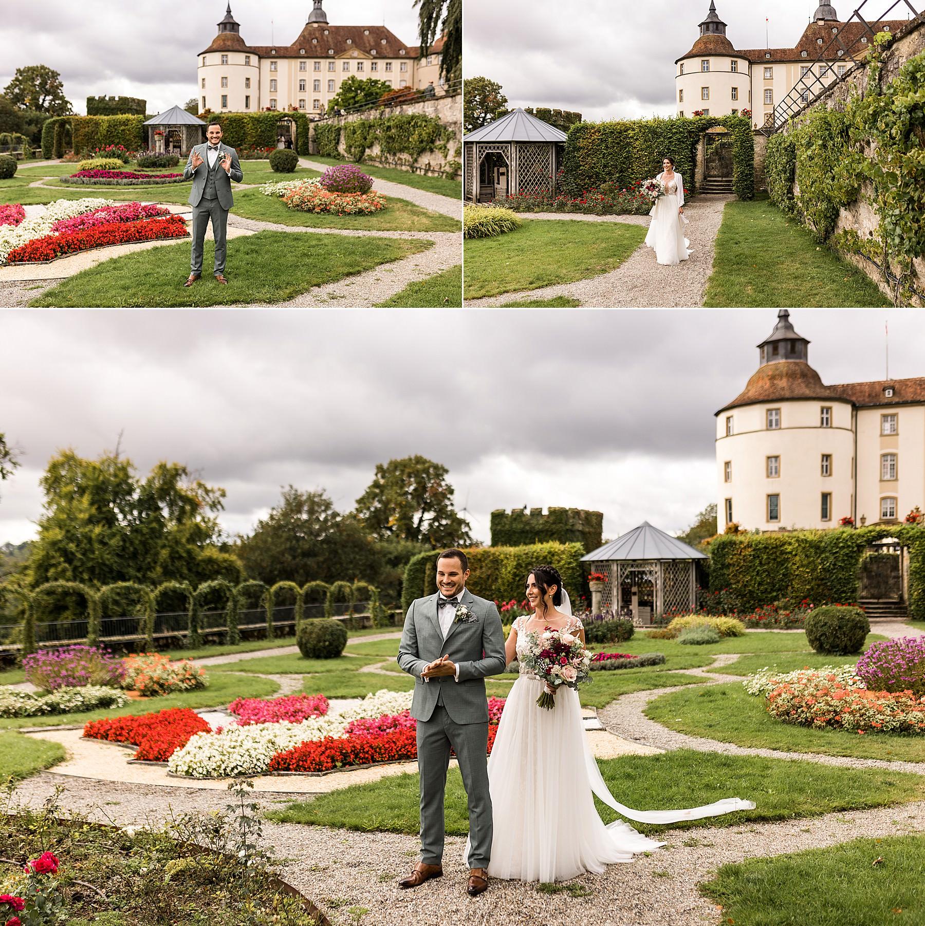 First Look von Braut und Bräutigam im Garten von Schloss Langenburg